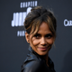 Halle Berry took to social media to throw shade at her distant relative, Sarah Palin.
